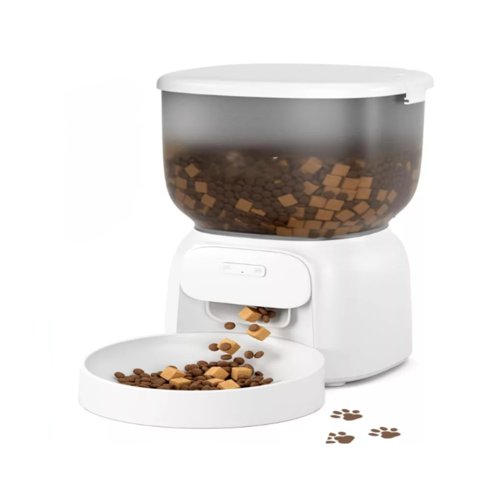 Golden retriever eating from a white automatic smart pet feeder with timer and portion control