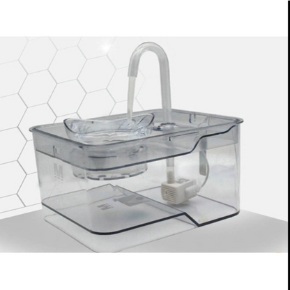 Gray tabby cat drinking from a smart pet water fountain with continuous fresh water flow
