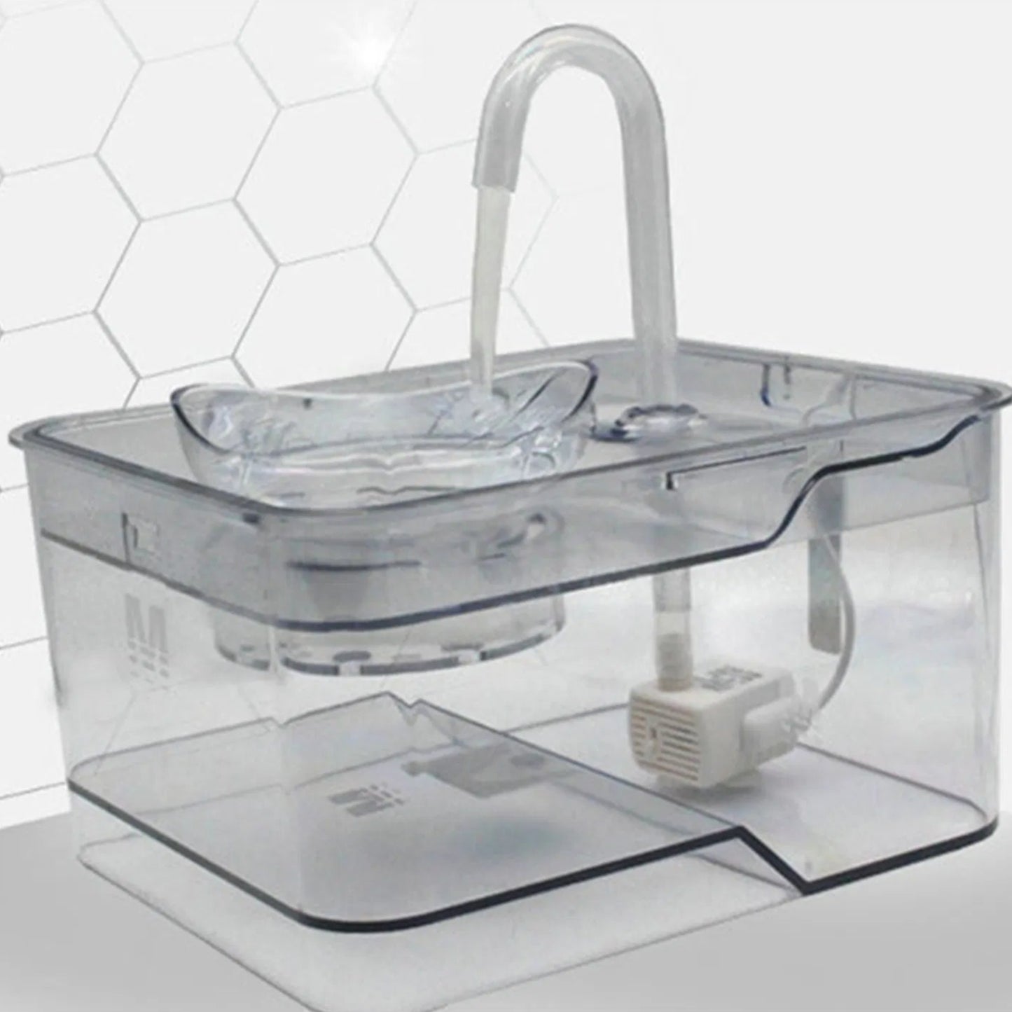 Gray tabby cat drinking from a smart pet water fountain with continuous fresh water flow